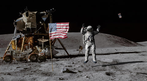 Astronaut jumping on the moon with the America Flag with Astronaut Ice Cream.